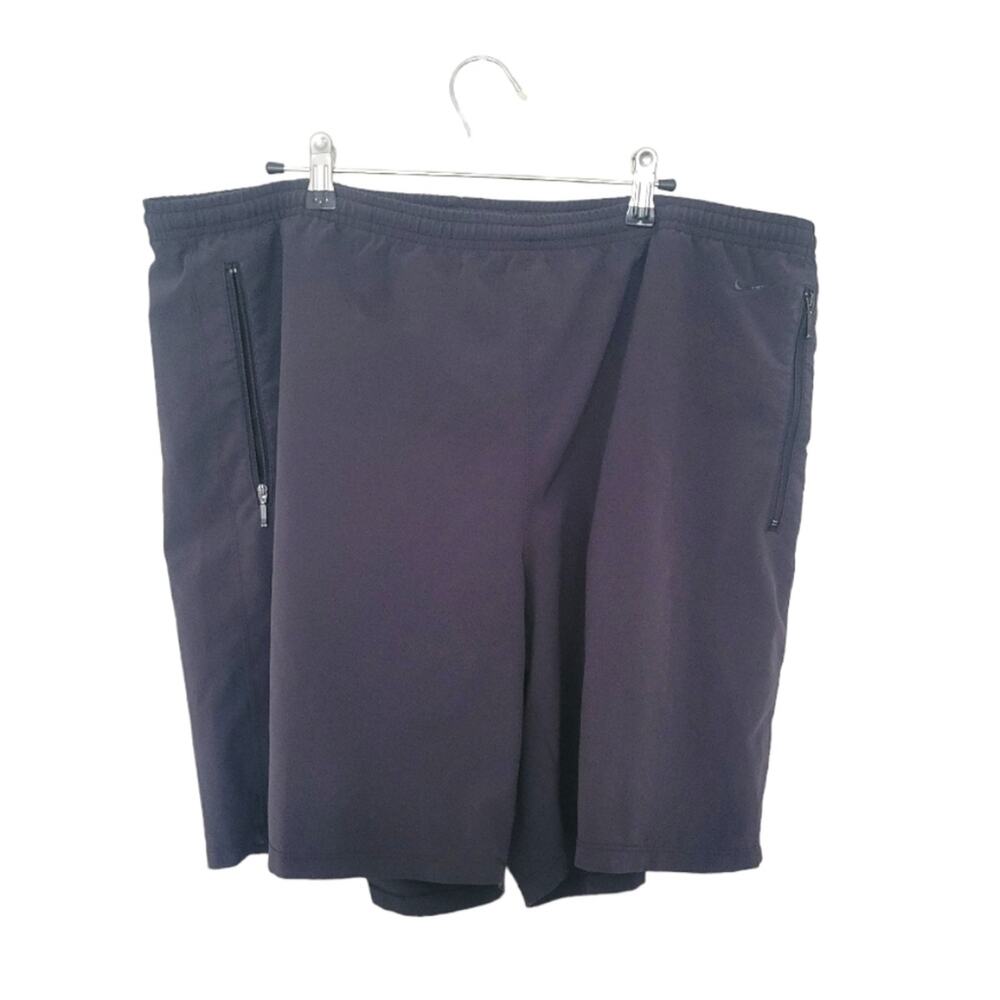 Large Nike black athletic shorts with zipper pockets elastic waist